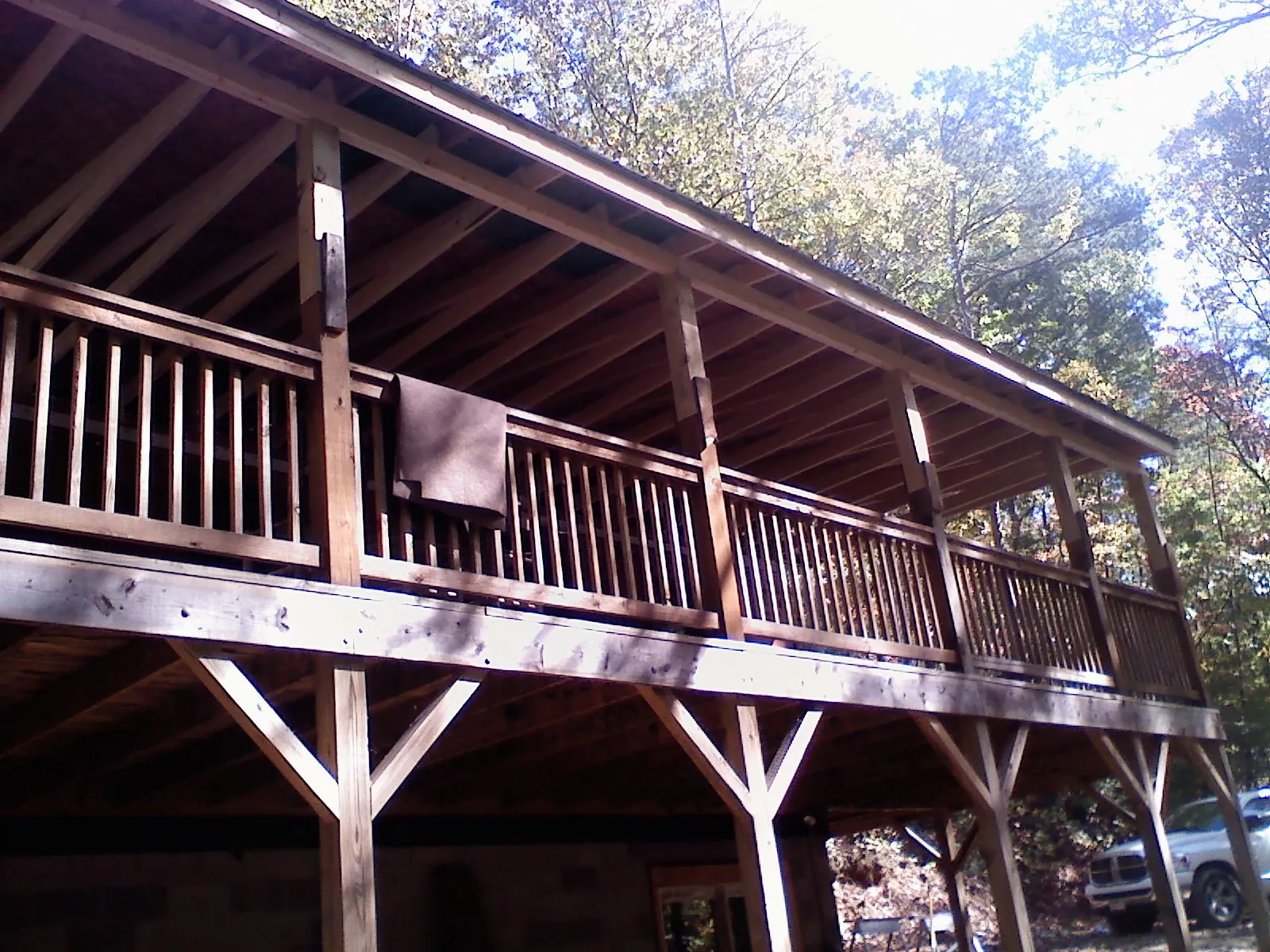 Timber framing under a new elevated porch and deck — Roof Leak Repair in Advent by Roofing Brothers